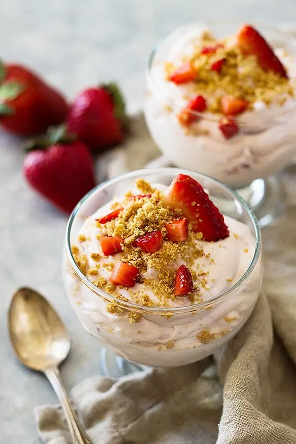 Two bowls of this strawberry cheesecake fluff recipe.