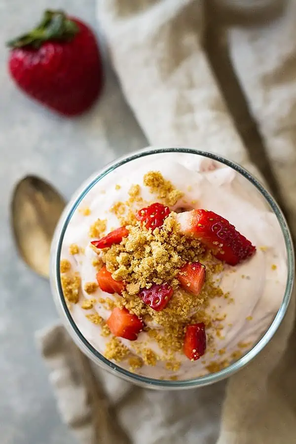 Top view of strawberry fluff salad with spoon.