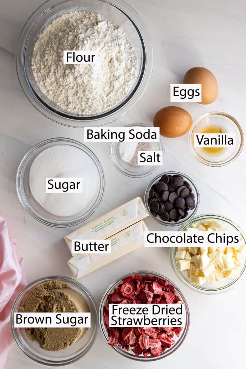 Ingredients: flour, eggs, vanilla, sugar, brown sugar, baking soda, salt, chocolate chips, butter, freeze-dried strawberries.