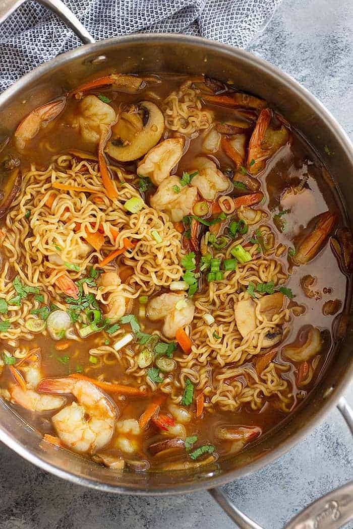 top down view of seafood ramen in a pot