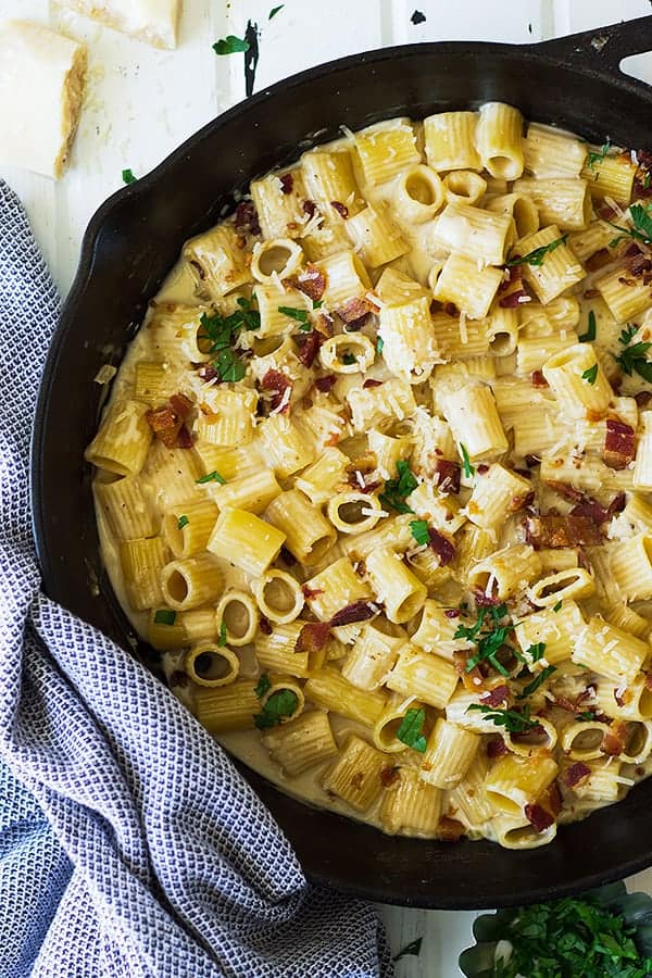 overhead: bacon alfredo in a large skillet
