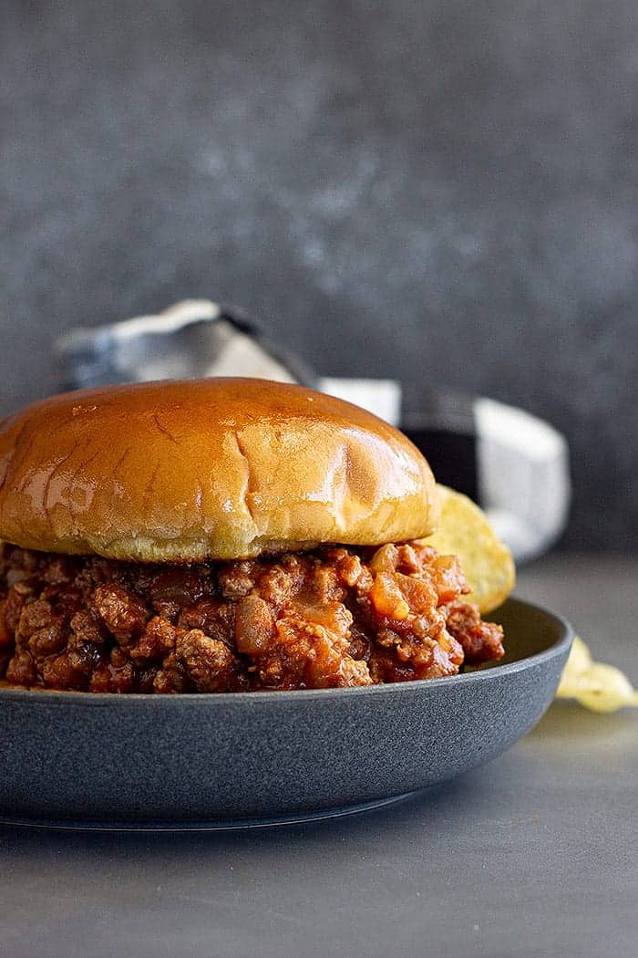 easy sloppy joe recipe with ketchup on a blue plate