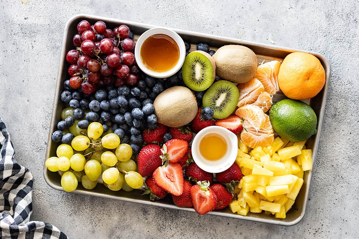 Overhead picture of all the fruit ingredients on a sheet pan.