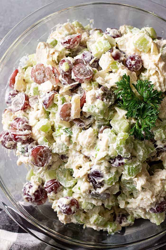 overhead image of a bowl of chicken salad with grapes