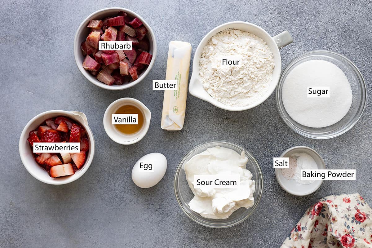 Ingredients: Rhubarb, strawberries, flour, butter, vanilla, sugar, salt, baking powder, sour cream, and egg. 