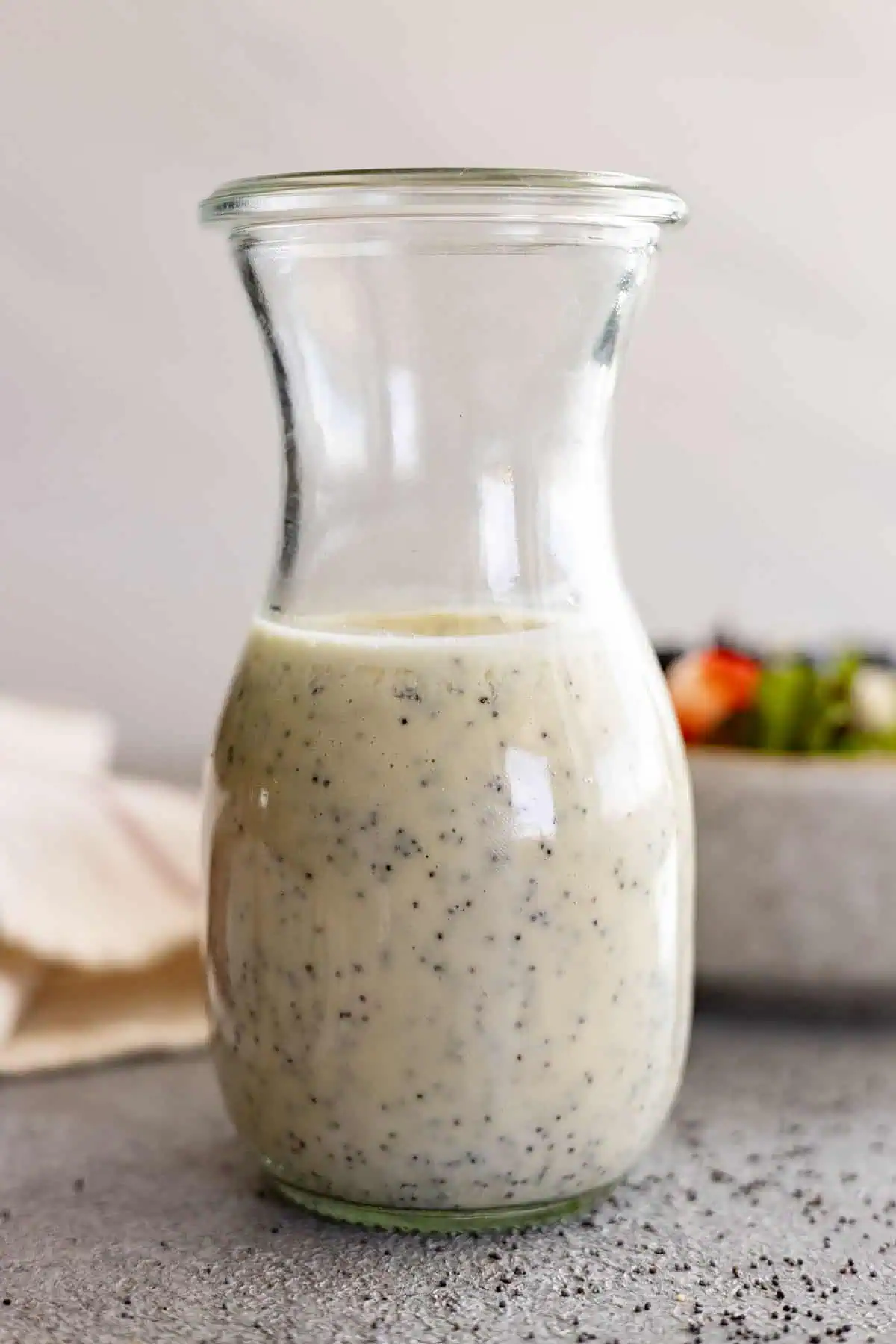 Creamy poppyseed dressing in a bottle.