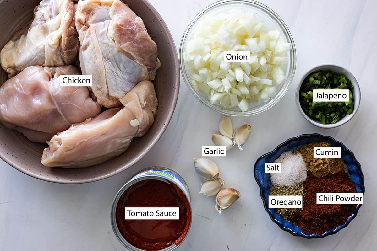 Ingredients: chicken, onion, jalapeno, tomato sauce, garlic, chili powder, salt, cumin, and oregano.