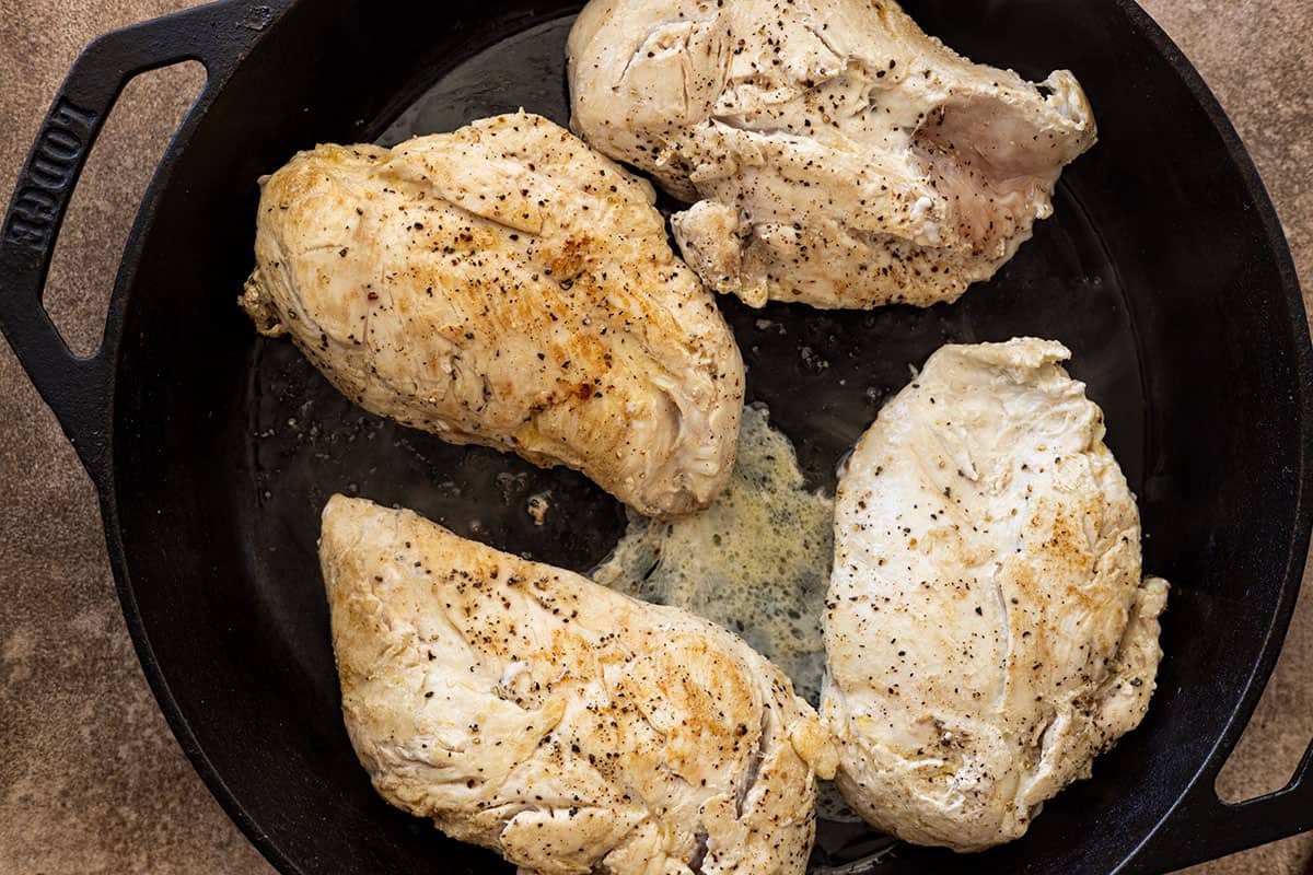 Lightly browned chicken breasts. 