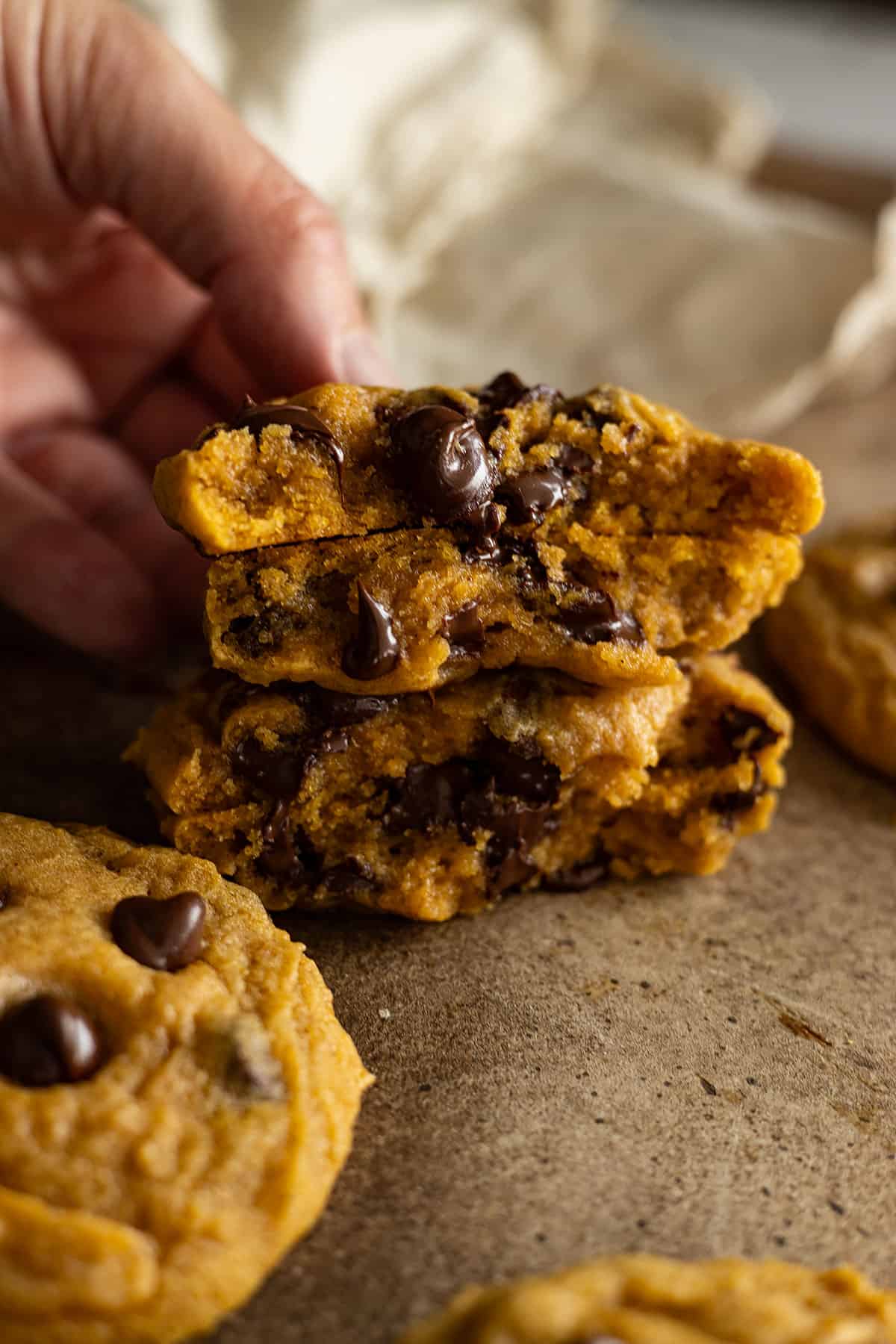 Cookies broke in half showing the delicious gooey middle.