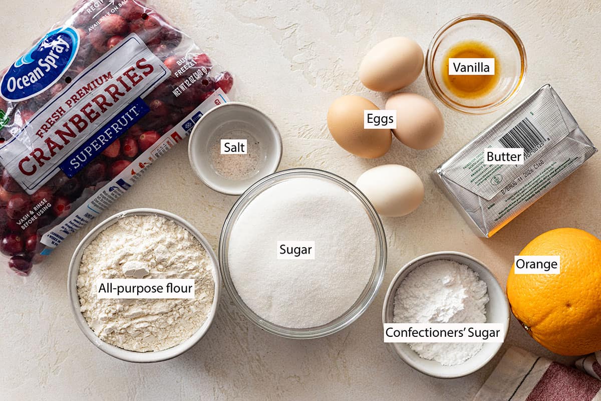 ingredients: cranberries, salt, eggs, vanilla, butter, sugar, confectioners sugar, orange, all-purpose flour. 