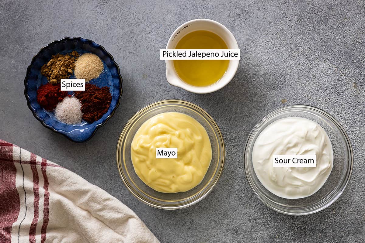 Spices, pickled jalapeno juice, mayo, and sour cream.