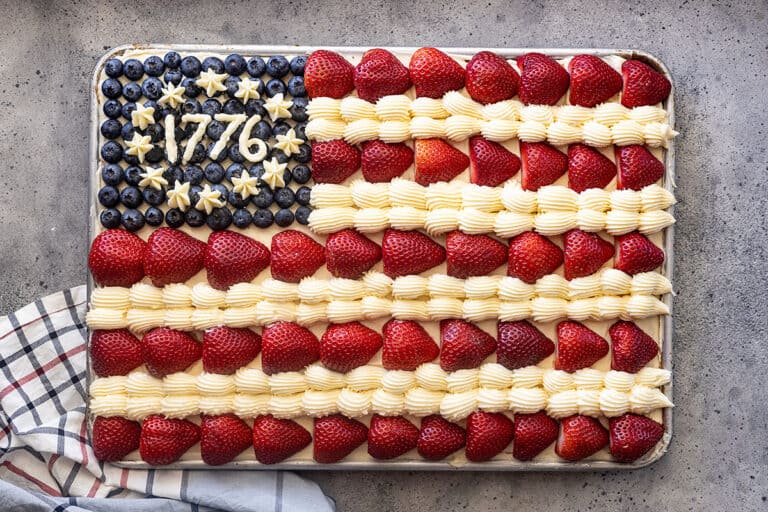 Overhead view of American flag cake completely decorated.