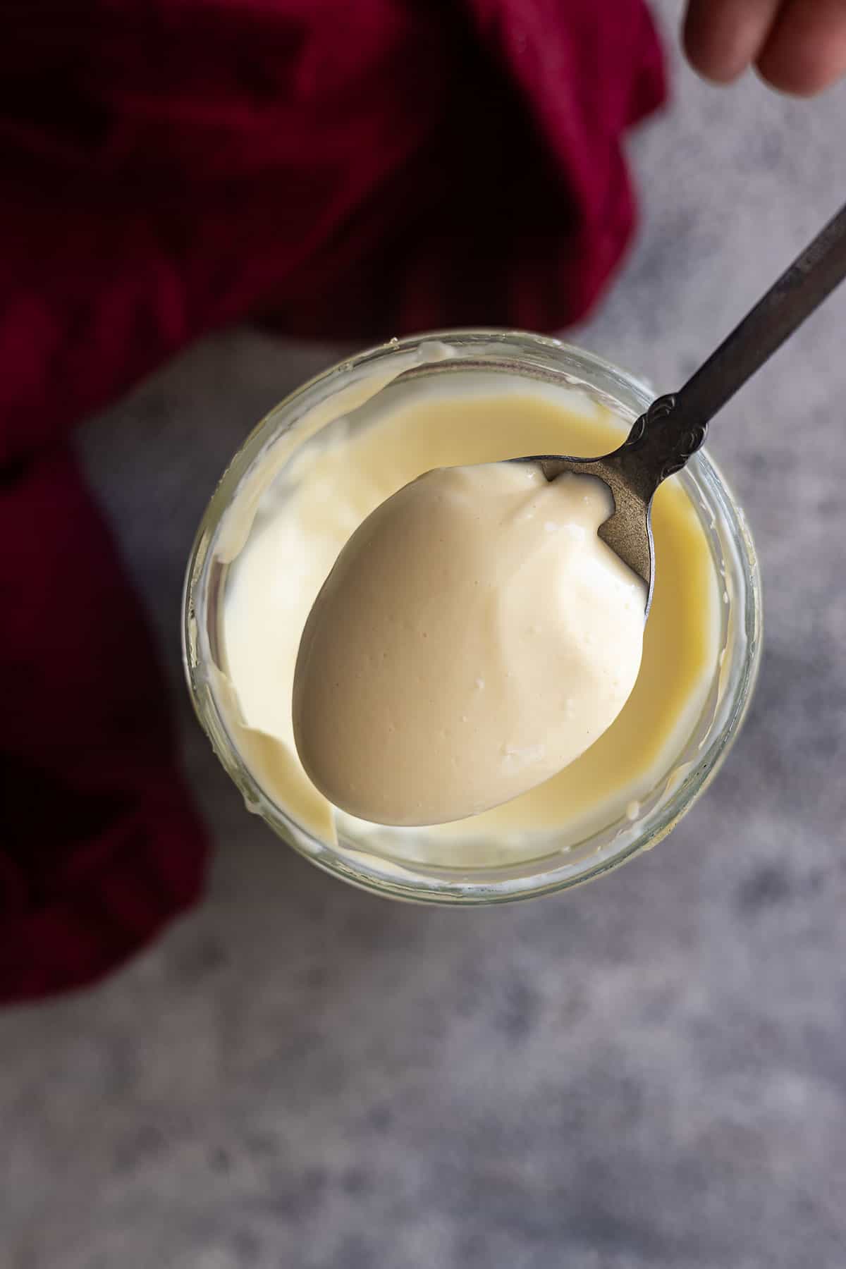 Overhead picture of a spoonful of mayonnaise.