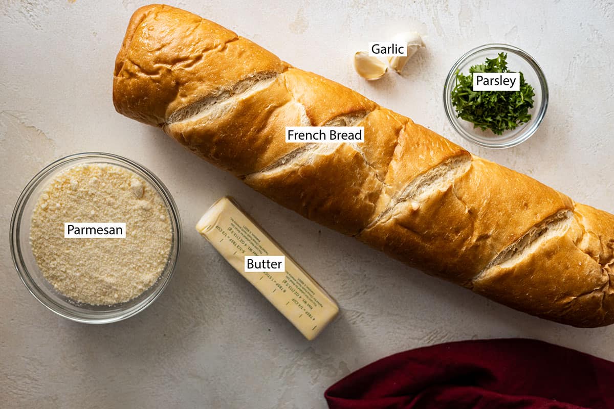 Ingredients: French bread, salted butter, Parmesan cheese, garlic, and parsley.