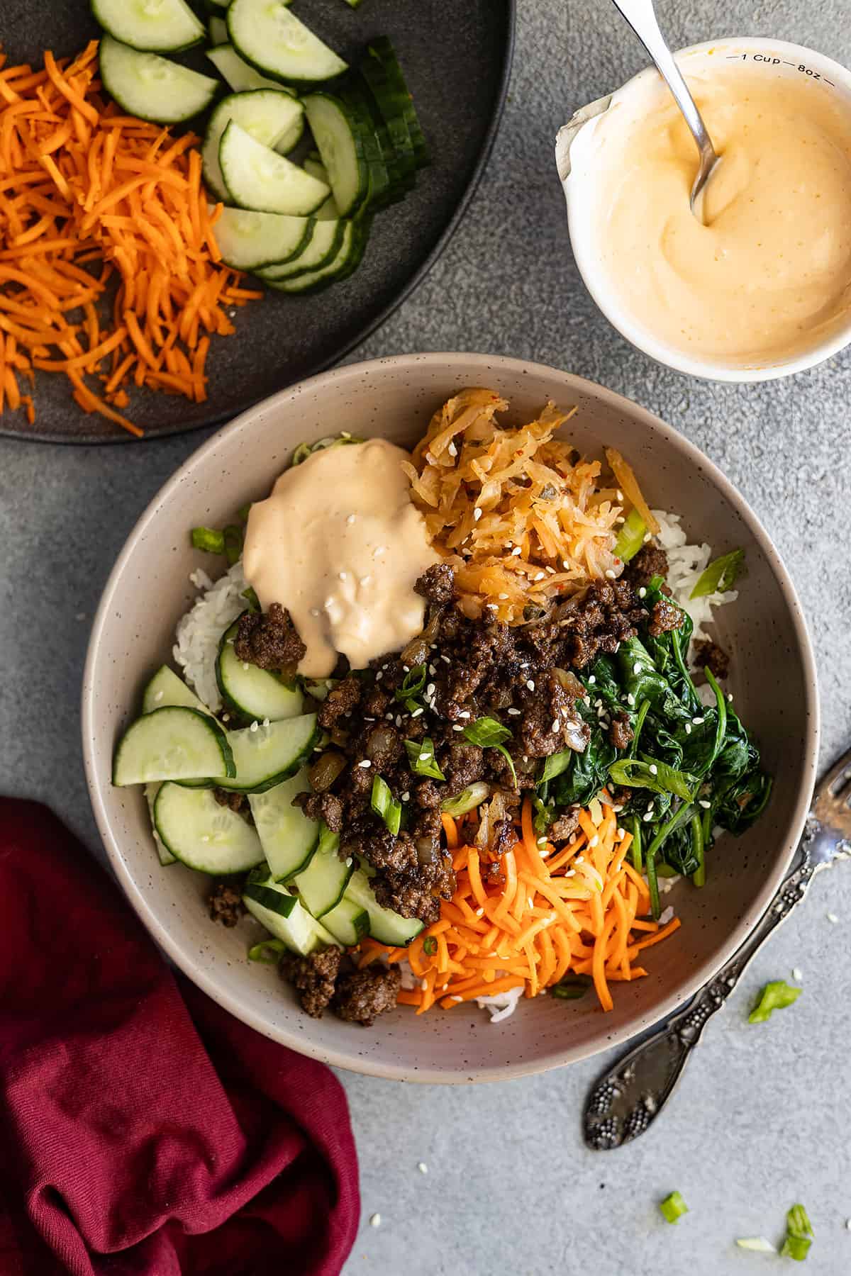 Overhead view of a fully loaded korean ground beef bowl.